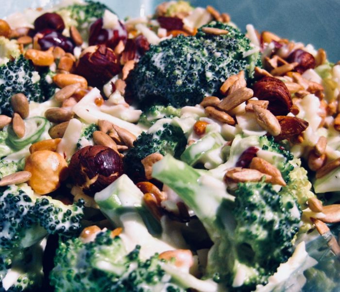 Creamy raw broccoli and roasted nut salad